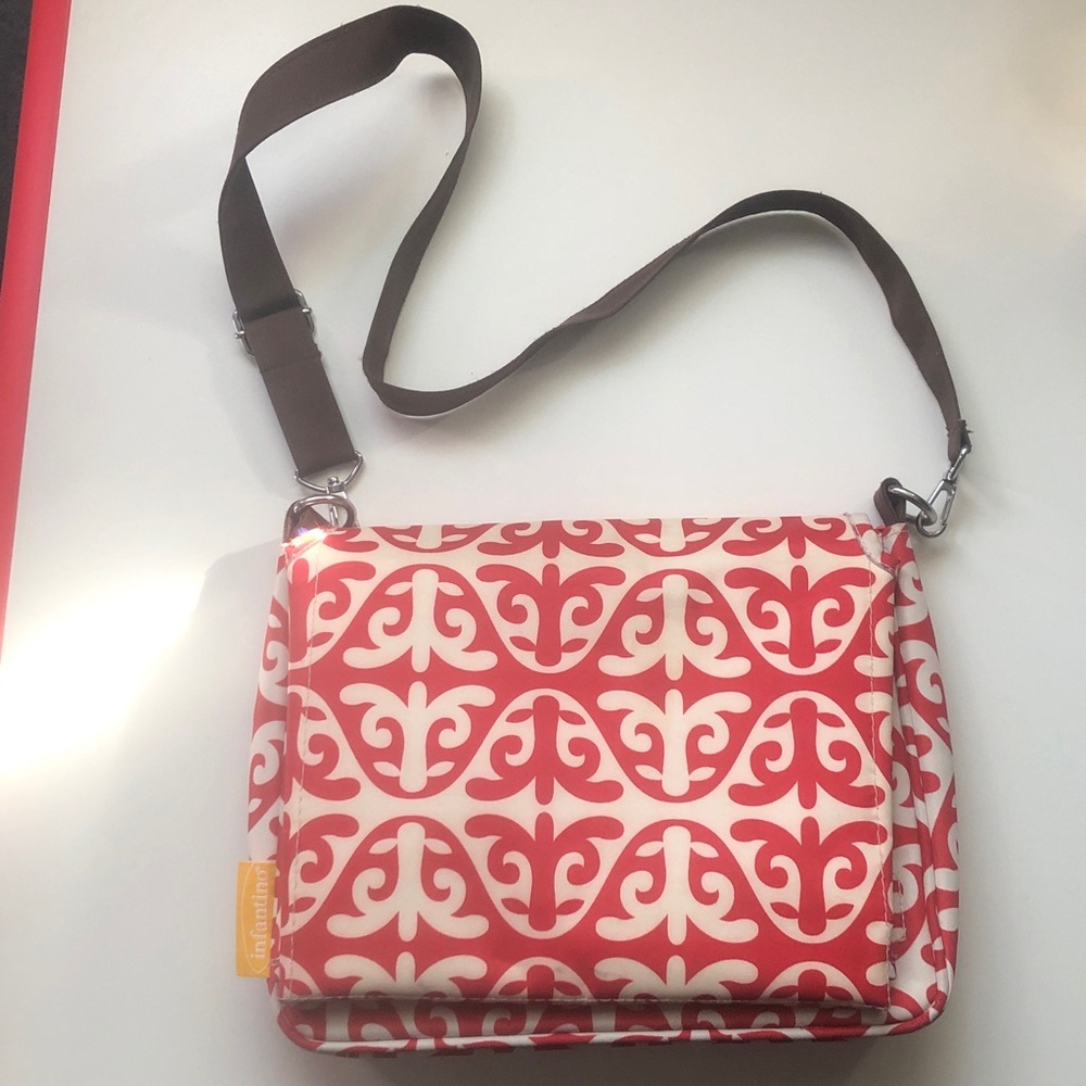 Infantino Red and Cream Baby changer on the go!